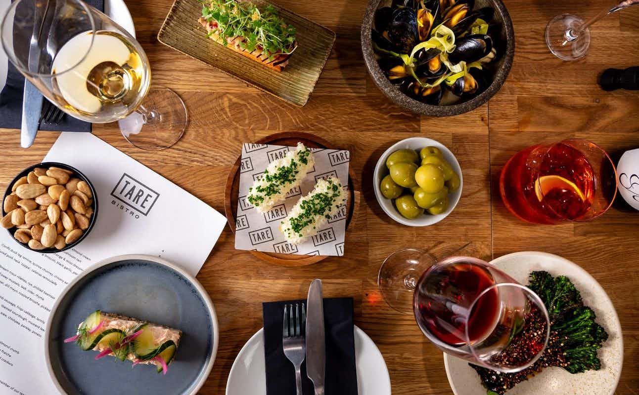 Enjoy British, Vegetarian options, Vegan Options, Bars & Pubs, Wine Bar, Private Dining, Table service, Indoor & Outdoor Seating, Wheelchair accessible, $$, Groups and Wine Bar cuisine at Tare Bistro in Wapping Wharf, Bristol